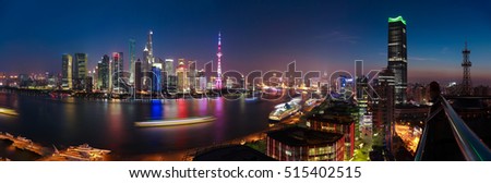 Aerial photography bird view city landmark buildings background at Shanghai Skyline of panorama of night scene
