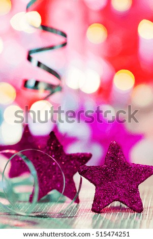 Christmas background with three stars and colored glitter