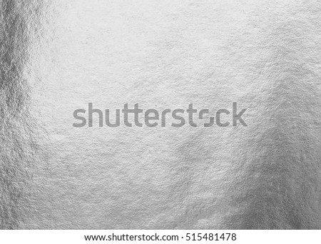 Silver foil shiny metal texture background wrapping paper for wall paper decoration element Royalty-Free Stock Photo #515481478