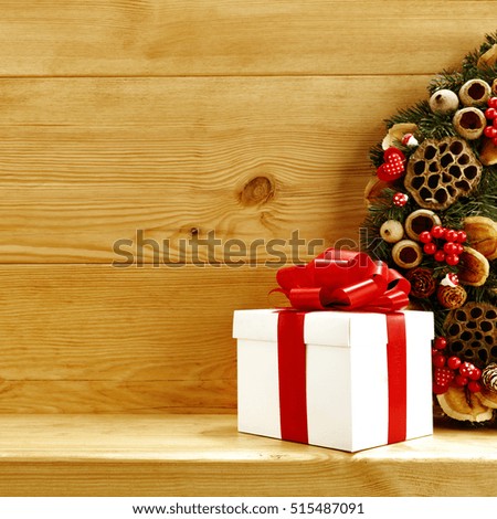 christmas background with xmas gift on wooden background 