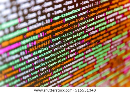 Developer working on websites codes in office. Internet security hacker prevention. Monitor closeup of function source code. Server logs analysis. Mobile app developer. Binary digits code editing. 
