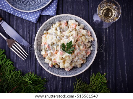 Traditional Russian Christmas and New year salad "Olivier". Selective focus Royalty-Free Stock Photo #515581549