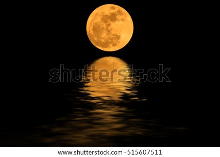 Super moon yellow and shadows in the water.