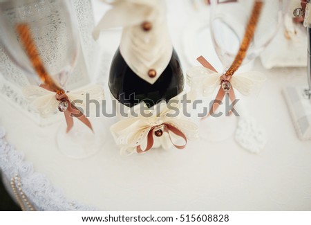 Beautiful wedding accessories and decorations on the table