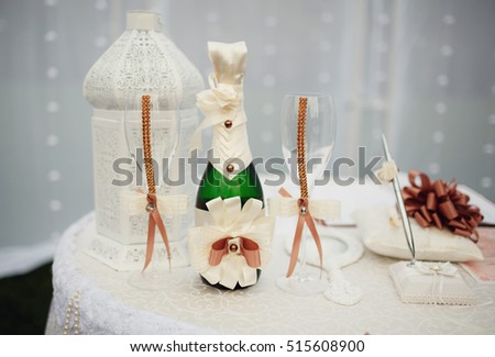 Beautiful wedding accessories and decorations on the table