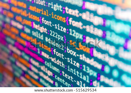 Web site codes on computer monitor. Notebook closeup photo. Technology background. Software abstract background. Script procedure creating. Software development. Programming code typing. 
