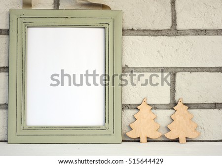 Christmas and New Year background. Empty picture frame, fir with with copy space blank tag on white background. Copy space image. Scandinavian style home interior decoration