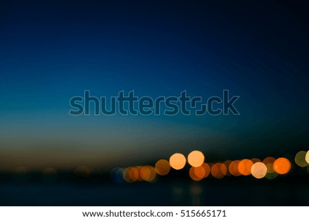 Bokeh light background of shopping street in night time outdoors