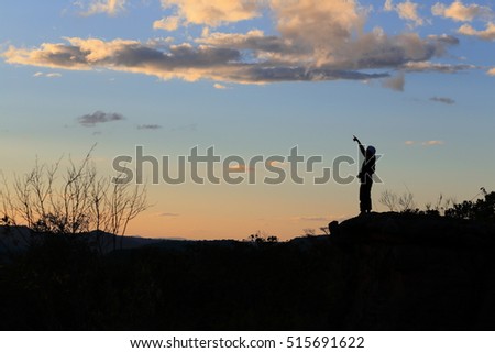 tourist standing in the peak mountain 