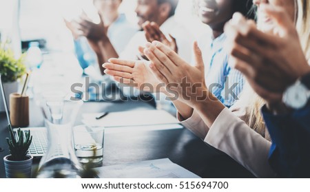 Close up view of business seminar listeners clapping hands. Professional education, work meeting, presentation or coaching concept.Horizontal,blurred background Royalty-Free Stock Photo #515694700