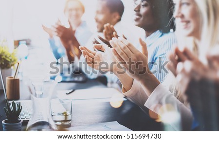 Photo of partners clapping hands after business seminar. Professional education, work meeting, presentation or coaching concept.Horizontal,blurred background Royalty-Free Stock Photo #515694730