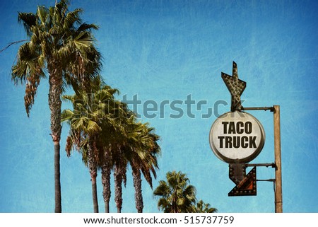 vintage taco truck sign with palm trees                           