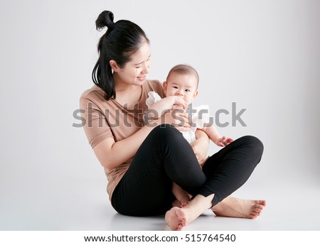 portrait of asian mother and baby lifestyle image

