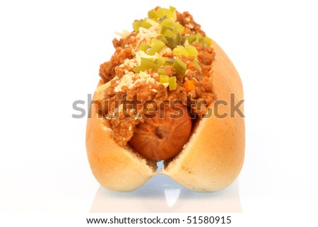 hot dog against white background with chili , onions and pickles on top  frontal picture