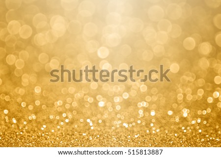 Abstract gold glitter sparkle confetti gala background or golden texture party invite for happy birthday, anniversary, wedding, new year’s eve or Christmas celebration Royalty-Free Stock Photo #515813887