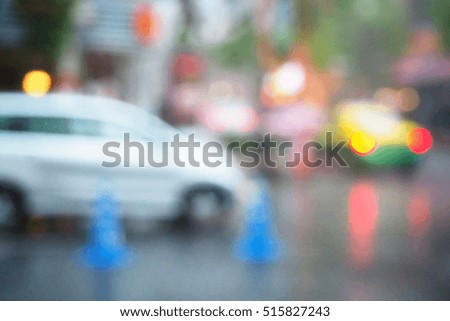 Blurred  background abstract and can be illustration to article of Traffic in rainy day in the city