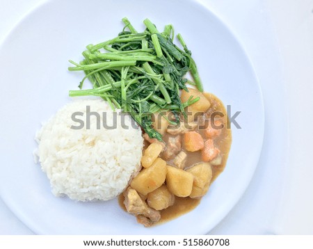  Japanese curry with curry and Stir Fried Water Spinach with rice in white dish isolate on white background 