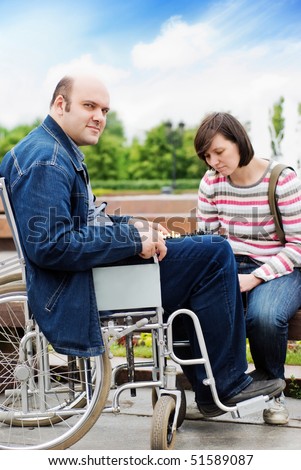 Man in wheelchair with his girlfriend