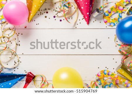 Decoration for the party. design concept. wooden white background. Top view. Royalty-Free Stock Photo #515904769