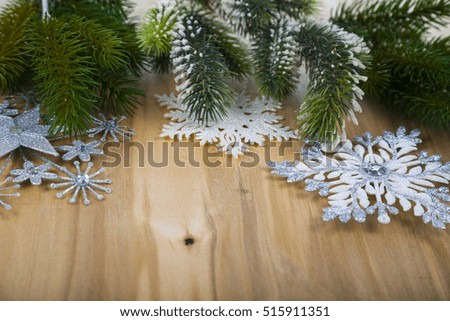 Christmas ornaments on the wooden background. 