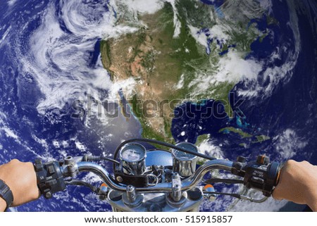 Man riding a motorcycle, blur image of the Earth as background..(Elements furnished by NASA)