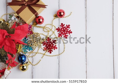 Top view of Happy christmas and Happy new year festival with decoration ornament, sock and gift box concept on white wood background. Selective focus and space vintage style.