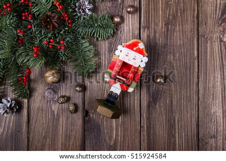Nutcracker at the wooden background christmas decoration 