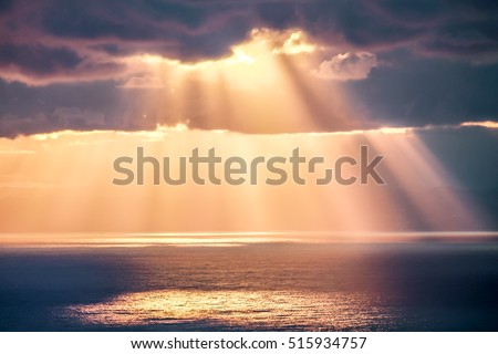Rays of light after storm, seascape photography.