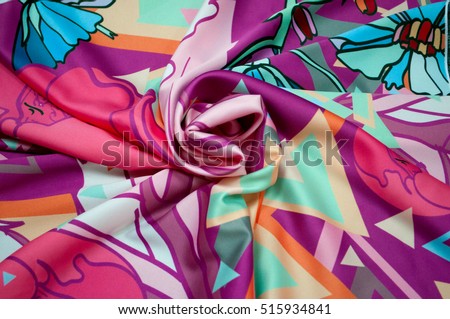Photo silk fabric. Silk scarf with bright abstract print. Flower pattern with poppies and cornflowers. Textile Design