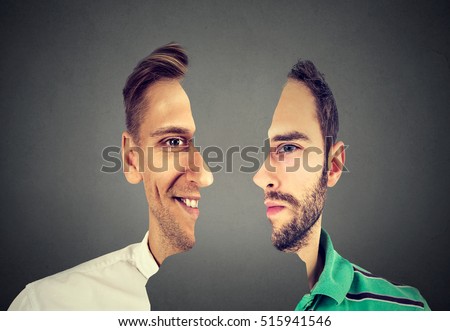 surrealistic portrait front with cut out profile of two young men isolated on grey wall background