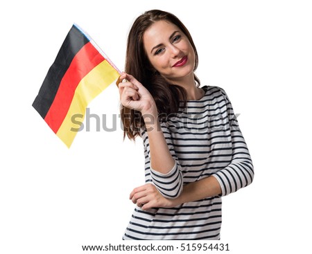 Pretty young girl holding a germany flag