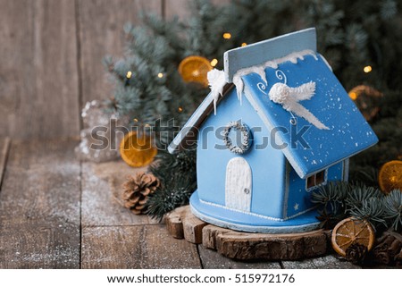 Winter's Tale. Christmas magic and homeliness. Gingerbread house. Copy of space.