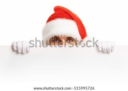 Santa Claus with a banner sales. Santa Claus peeping from behind a banner. Christmas banner sales. Christmas sale.