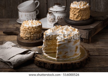 Sponge cake with cream. The process of cooking. Festive sweets.