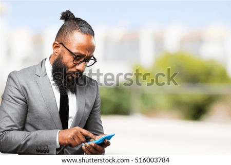 business black man holding calculator
