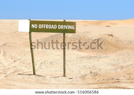 Attention, no offroad driving sign board at 4x4 tracks in rough desert terrain, Namib Naukluft, Skeleton coast, Namibia, southern Africa