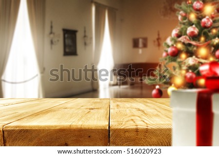 xmas tree and wooden desk space 