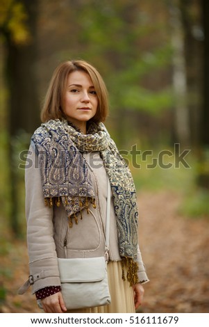 Beautiful elegant girl in fashionable clothes for autumn season