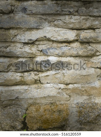 Paving stone wall texture grunge background with vignetted corners, may use to interior design.