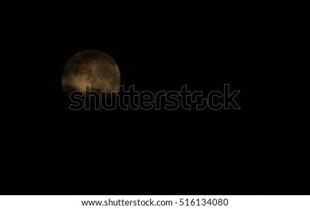 Super moon in picture looklike the dark night starting bad thing comes, vampire, ghost, whitch, magician, cloud infront of moon