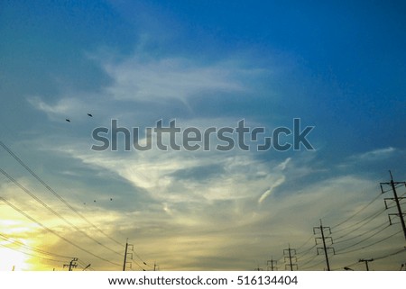 beautiful closeup tiny cloud with twilight sky foreground with aisle of electric pole