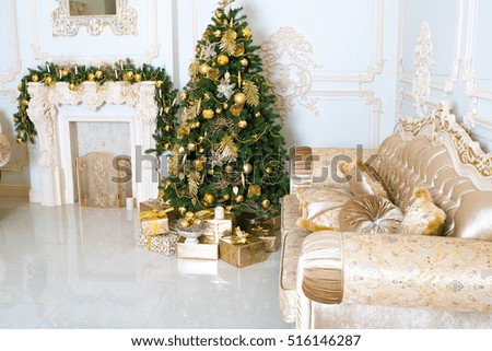 Luxury living room interior decorated with chic Christmas tree.