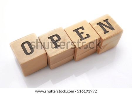 OPEN word made with building blocks isolated on white