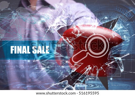 Business, Technology, Internet and network concept. Young businessman breaks the virtual future of the screen on which the inscription: final sale 