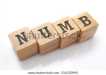 NUMB word made with building blocks isolated on white
