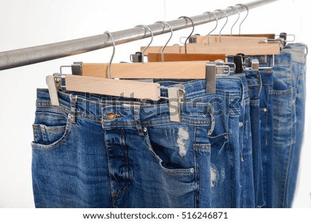 Blue jeans on a hanger