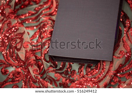 Transparent cloth with red details, abstract, shallow focus,  vintage
