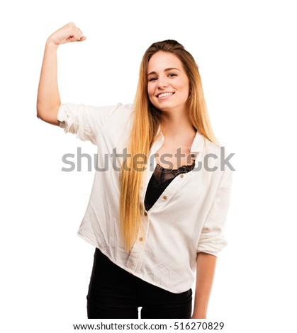 pretty young woman doing strong gesture