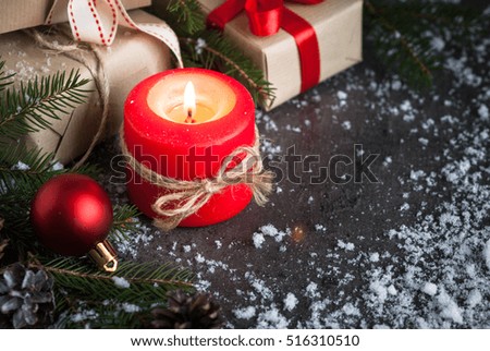 Christmas Festive background. Christmas decorations candle baubles and present. Greeting card. .