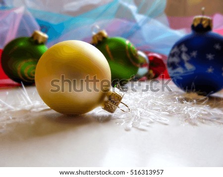 Beige ball on Christmas tree. Beautiful festive greeting card with colorful balloons and decor